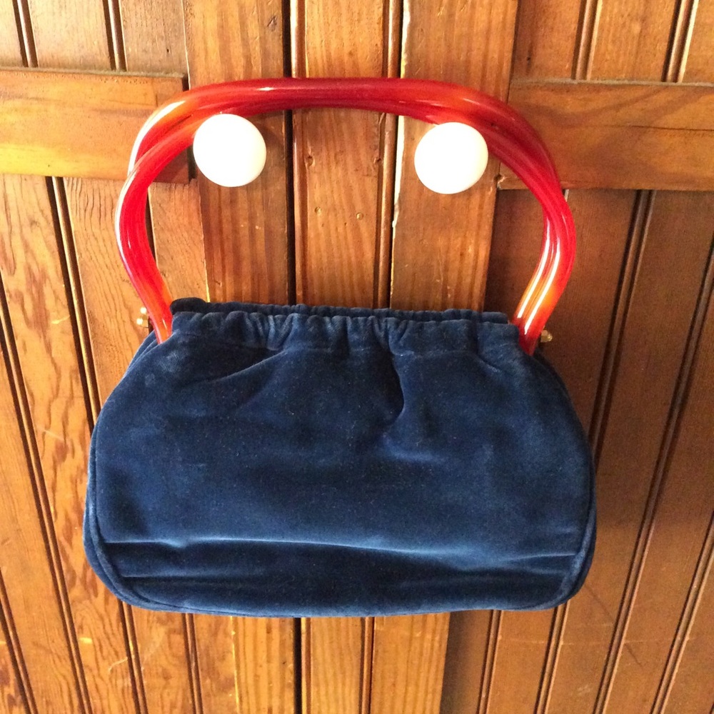 Blue velvet bag with cellulite handles